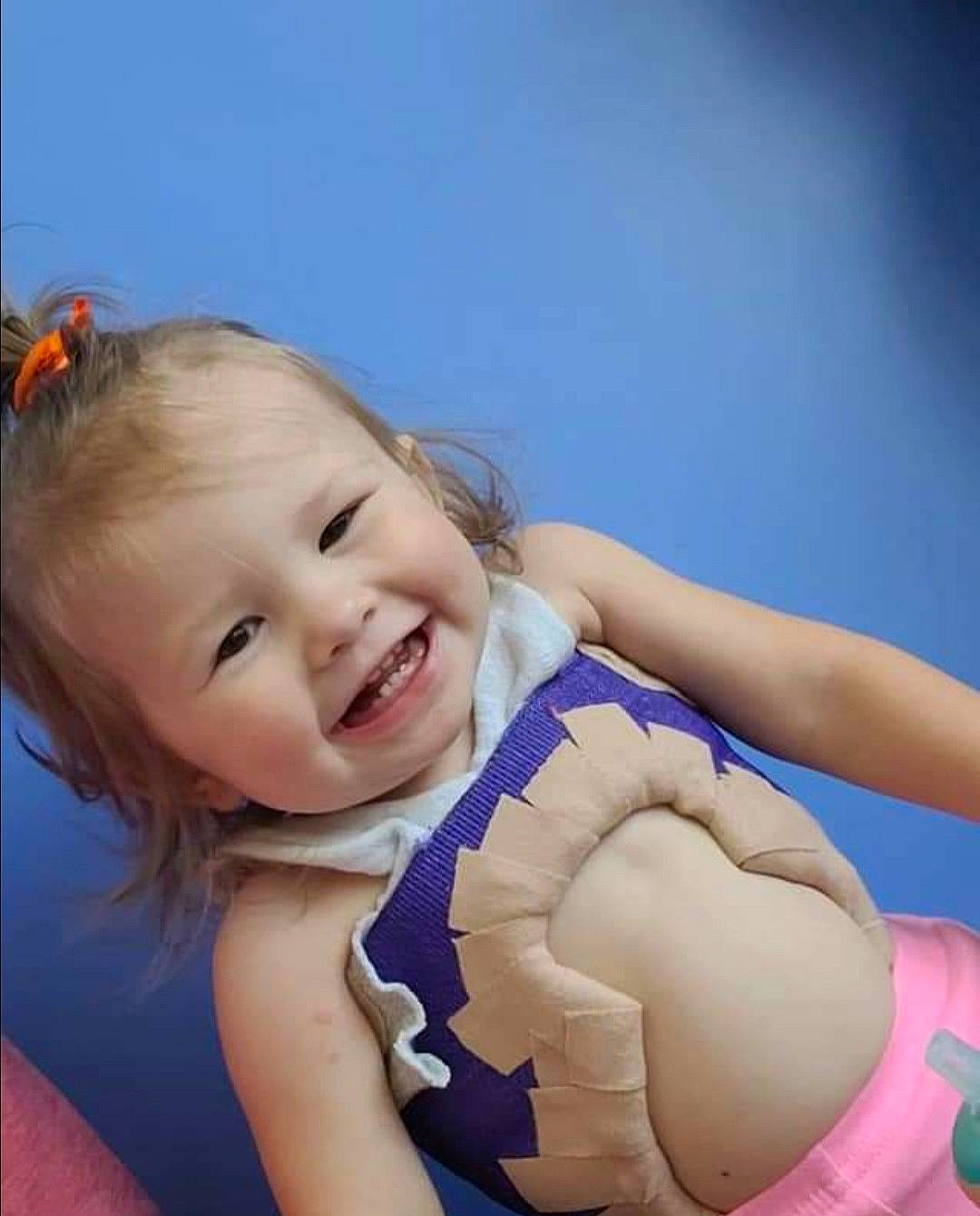 Kimber is registered to the contest to win money with this photo: arm, baby_toddler_clothing, cheek, chest, elbow, eyebrow, finger, flash_photography, fun, gesture, happy, human_body, iris, joy, mouth, neck, person, shoulder, skin, smile