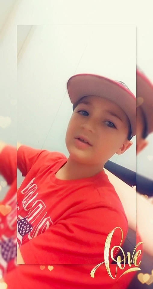 Dylan joined the competition — help win amazing prizes! baseball_cap, cap, chin, elbow, eyebrow, eyewear, finger, forehead, fun, gesture, happy, hat, headgear, headwear, leisure, lip, neck, person, personal_protective_equipment, selfie