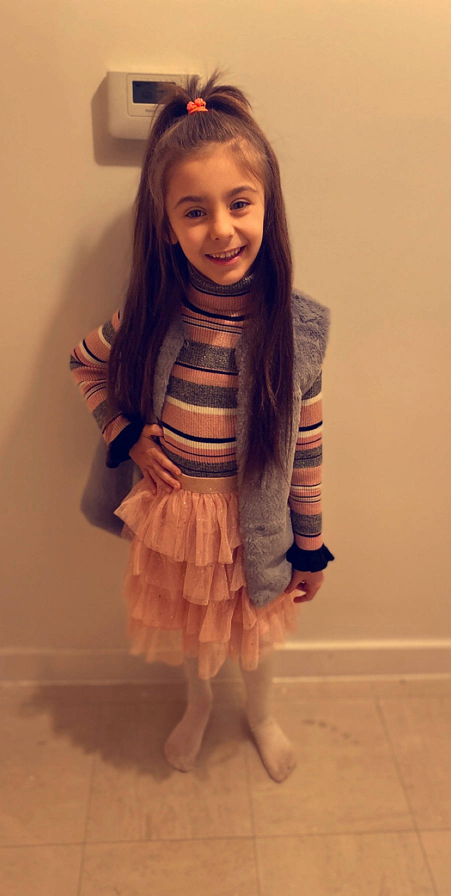Amelia-rose is registered to the contest to win money with this photo: brown_hair, child, child_model, clothing, costume, face, fashion_design, fawn, iris, joy, long_hair, outerwear, person, pink, smile, toddler