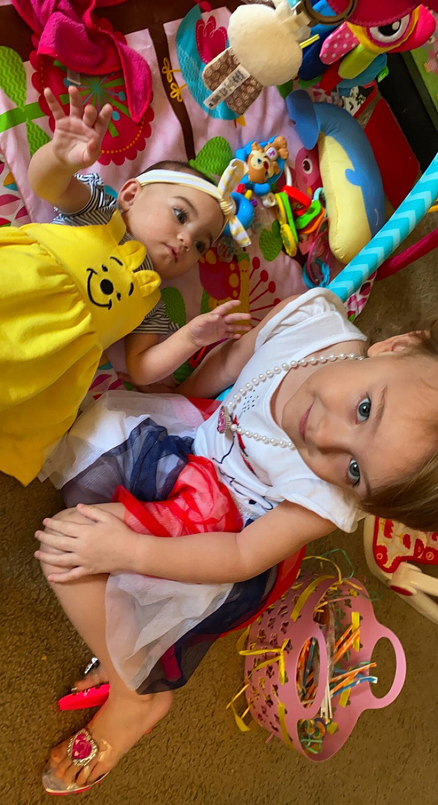 Dakotah is registered to the contest to win money with this photo: baby, baby_toddler_clothing, child, event, fun, grass, happy, hat, headwear, joy, leg, leisure, party, people, person, play, room, sandal, shorts, sitting