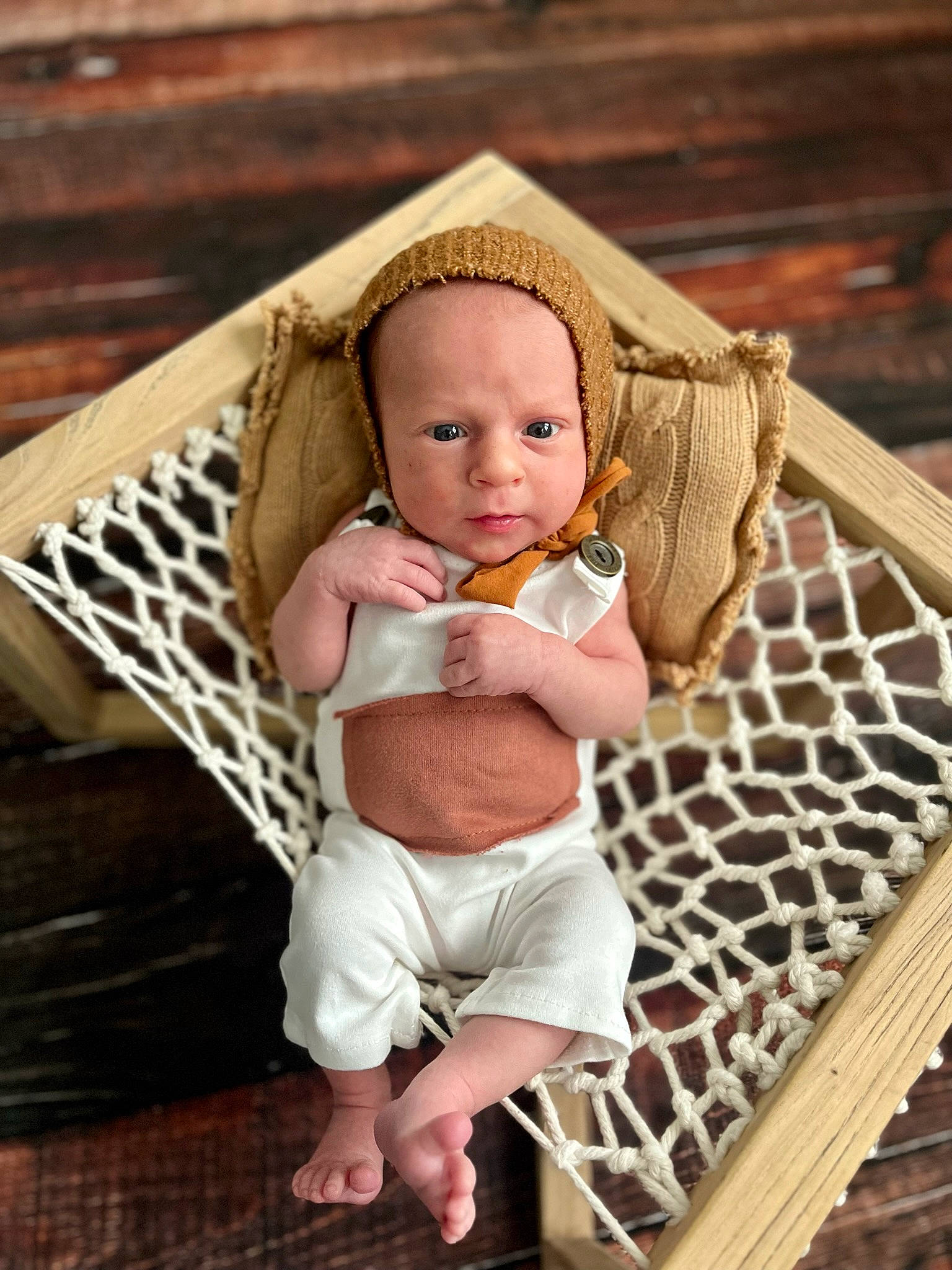 Destin is registered to the contest to win money with this photo: baby, baby_carriage, baby_products, baby_safety, baby_toddler_clothing, basket, chair, child, comfort, fashion_accessory, foot, grass, infant_bed, person, product, sitting, skin, sun_hat, toddler, wicker