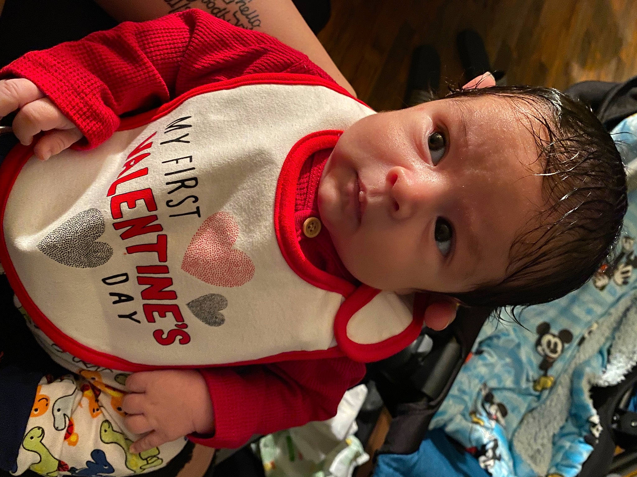 Isaac is registered to the contest to win money with this photo: baby, baby_toddler_clothing, carmine, cheek, child, elbow, fashion_accessory, happy, person, sleeve, toddler, tree, wood, wrist