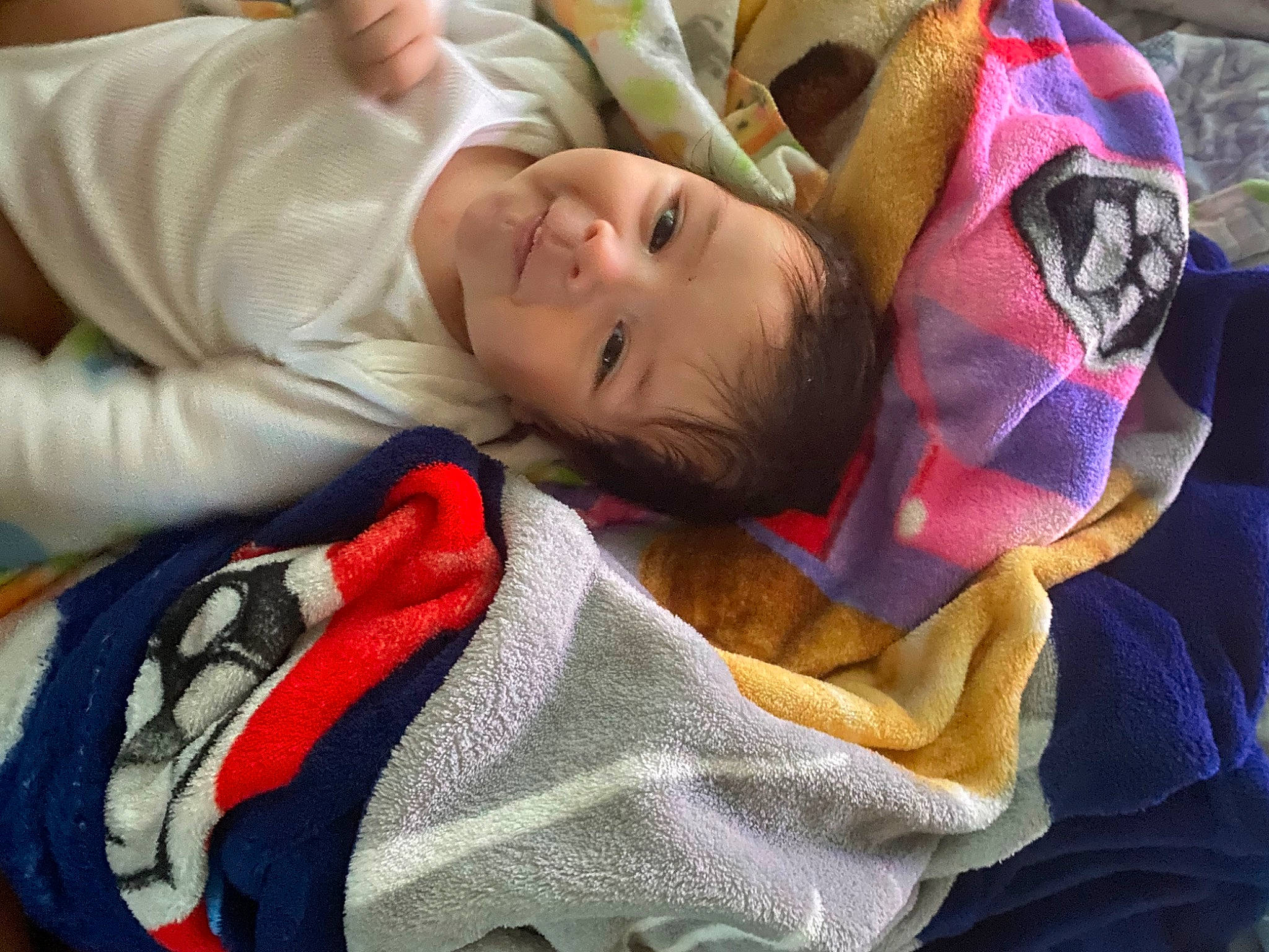 Isaac is registered to the contest to win money with this photo: baby, baby_products, baby_toddler_clothing, bedtime, blanket, carmine, child, comfort, happy, joy, linens, mammal, nap, person, room, skin, sleep, smile, textile, toddler