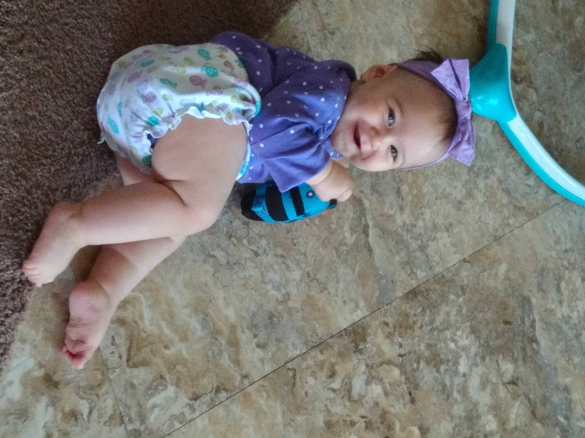 Olivia joined the competition — help win amazing prizes! baby, baby_products, baby_toddler_clothing, child, dress, electric_blue, eye, face, finger, flooring, foot, fun, grass, human_body, human_leg, joy, leg, leisure, person, skin