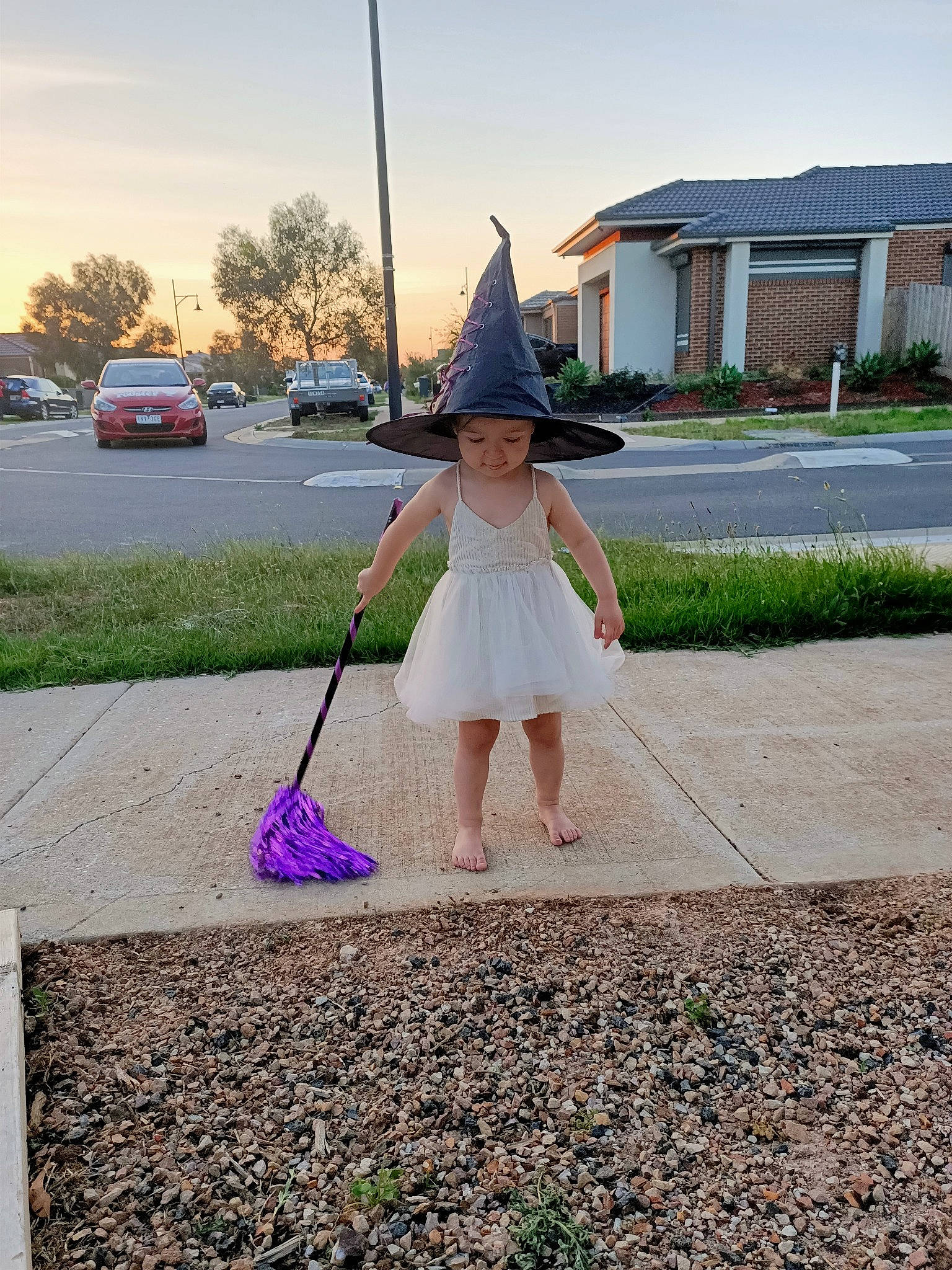Antonia is registered to the contest to win money with this photo: broom, child, grass, headwear, joy, person, purple