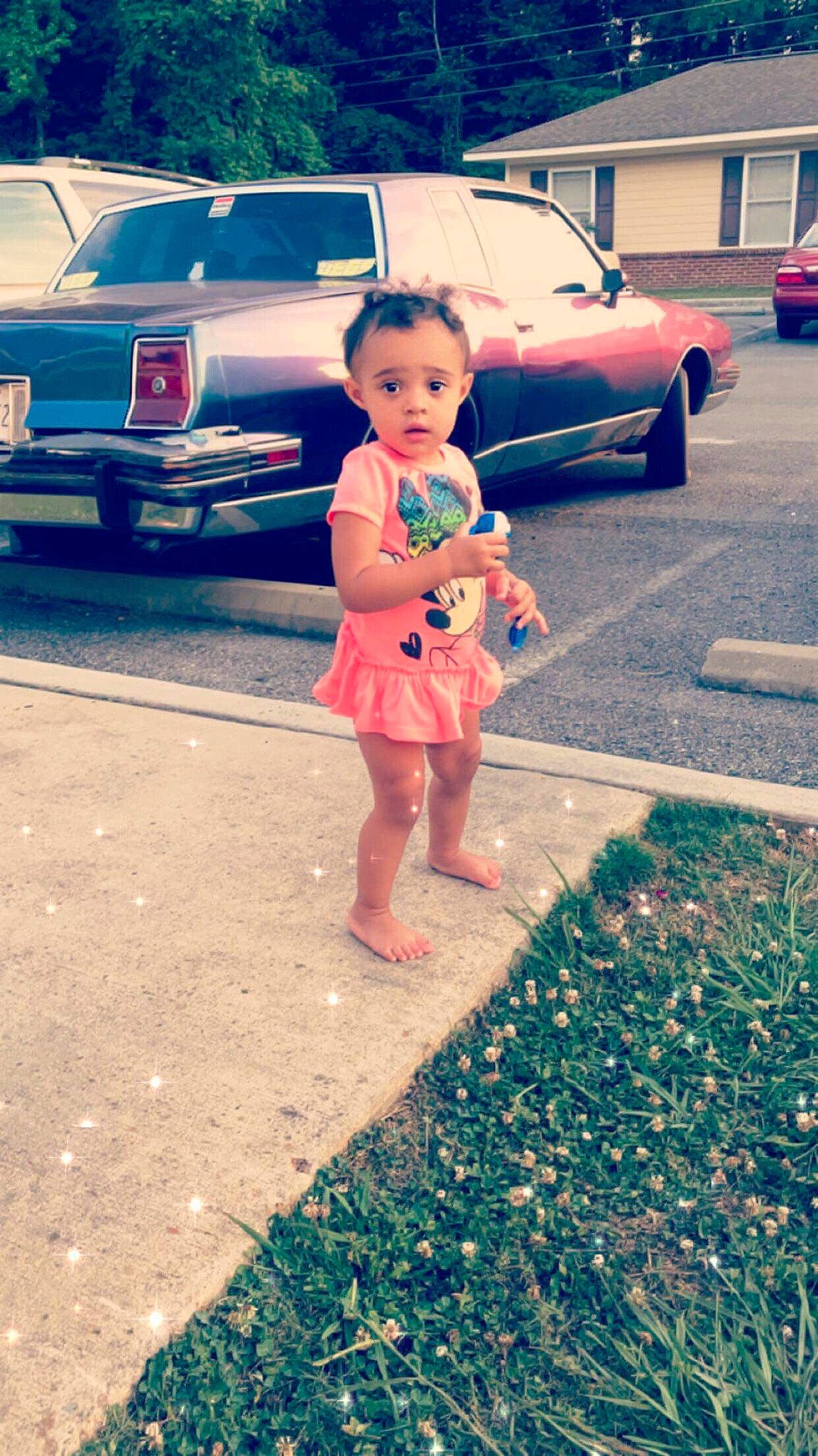 Kynslee is registered to the contest to win money with this photo: car, child, compact_car, dress, family_car, full_size_car, luxury_vehicle, person, plant, sedan, summer, vacation, vehicle, vintage_car