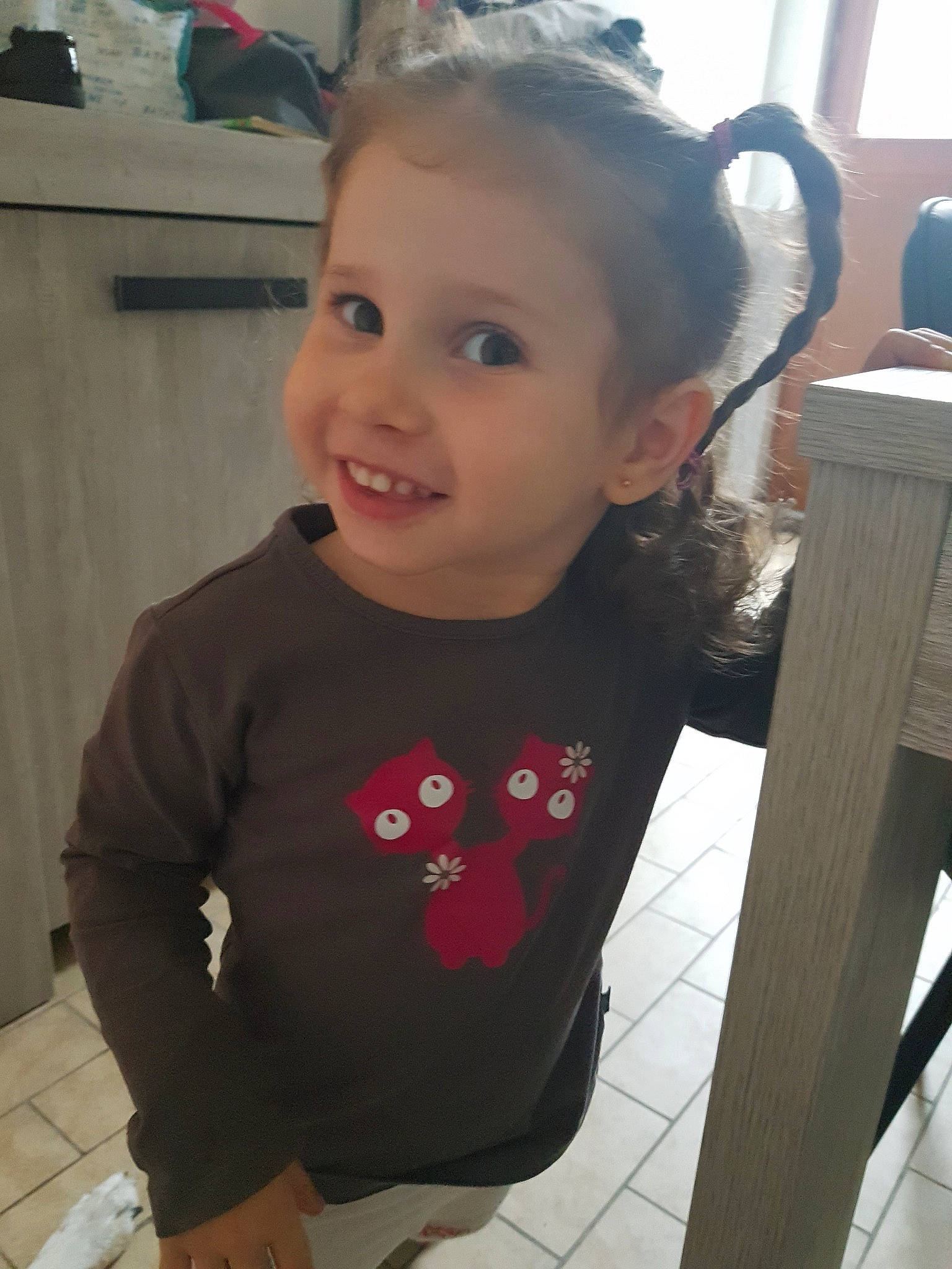 Evangeline participe au concours pour gagner de l'argent avec cette photo : cheek, child, cool, day, ear, eye, girl, hair, hairstyle, head, human_hair_color, infant, joy, outerwear, person, product, shoulder, skin, smile, standing