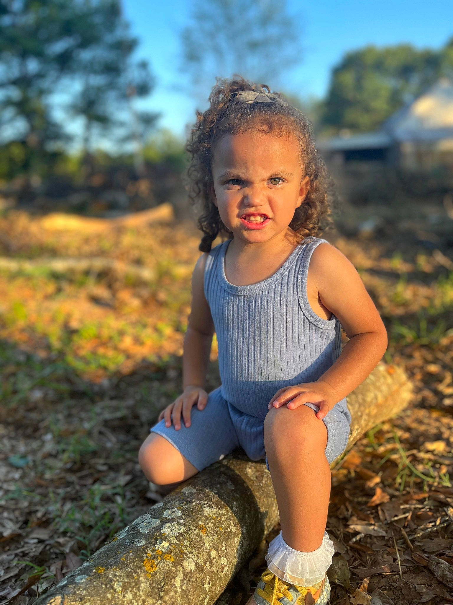 Kennedy is registered to the contest to win money with this photo: anger, beauty, electric_blue, face, flash_photography, fun, grass, hair, happy, head, landscape, leisure, people_in_nature, person, plant, sky, summer, sunlight, thigh, toddler