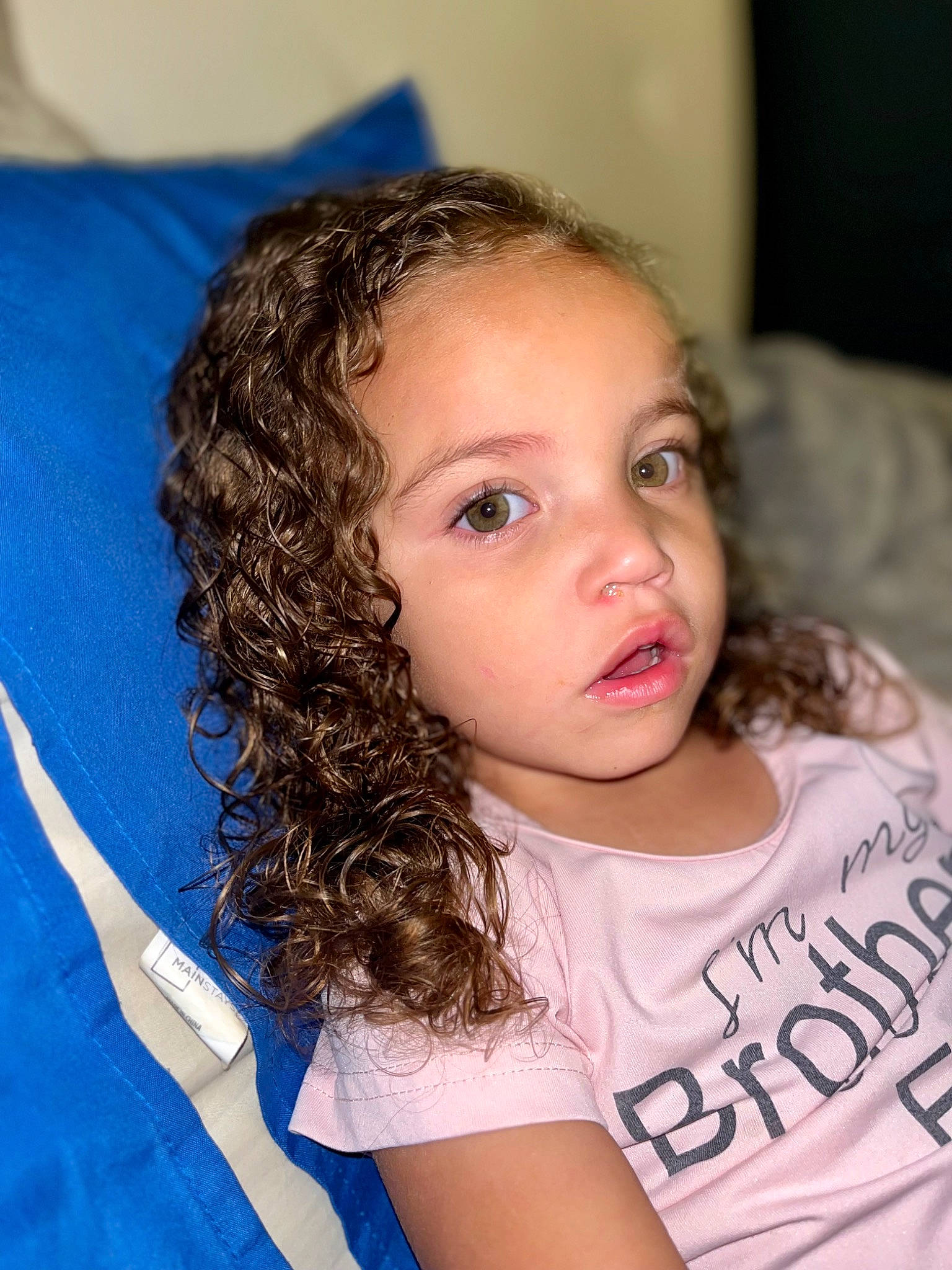 Kennedy is registered to the contest to win money with this photo: black_hair, cheek, chin, ear, eye, eyebrow, eyelash, facial_expression, flash_photography, forehead, happy, iris, jaw, jheri_curl, lip, mouth, nose, person, ringlet, skin