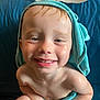 Jamison is registered to the contest to win money with this photo: child, toddler, smiling, wet_skin, towel, blue_towel, bath_time, indoors, happy, cute, face, teeth, skin, person, sitting, background, pizza, paper_towel, food, hooded_towel