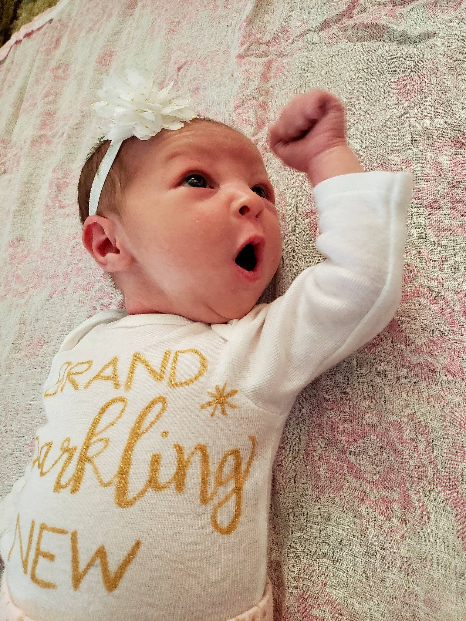 Echo is registered to the contest to win money with this photo: baby, baby_products, baby_toddler_clothing, cheek, child, face, facial_expression, happy, head, headwear, lip, mouth, nose, person, pink, product, skin, smile, surprise, textile