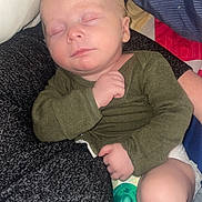 Virgil is registered to the contest to win money with this photo: baby, sleeping, infant, pacifier, blanket, clothing, cozy, hand, face, diaper, rest, comfort, pillow, soft, child, peaceful, nap, indoor, young, person