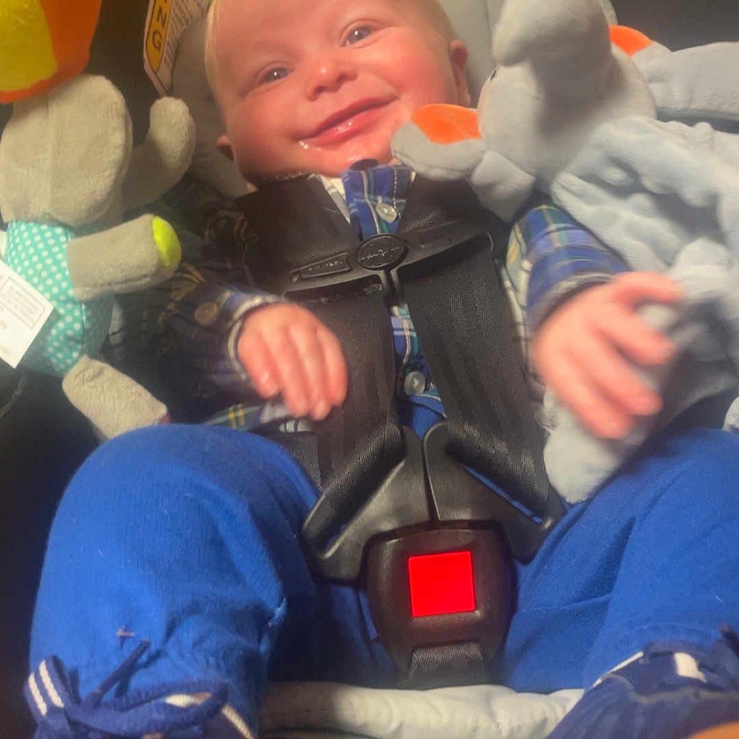 Virgil joined the competition — help win amazing prizes! baby, blue_pants, buckle, car_seat, child, close_up, cozy, elephant_plush, face, hands, happy, infant, interior, plaid_shirt, plush_toy, portrait, seat_belt, smile, sneakers, stuffed_animal