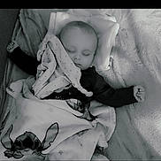 Gabriel participe au concours pour gagner de l'argent avec cette photo : baby, bedtime, blanket, cartoon, child, clothing, comfort, cozy, cute, indoors, infant, nap, peaceful, pillow, plush, rest, sleeping, soft, toddler