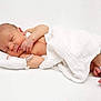 newborn, baby, sleeping, infant, blanket, hospital, iv_line, white_cloth, foot, hand, skin, peaceful, resting, indoors, healthcare, medical, soft_texture, cute, person, portrait