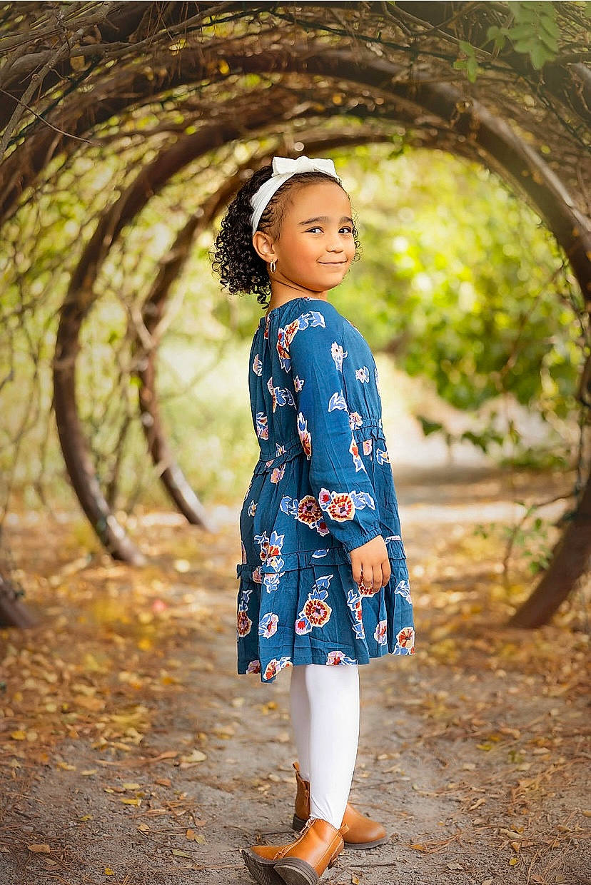 Damaris is registered to the contest to win money with this photo: arch, brown_hair, day_dress, dress, electric_blue, fashion_design, flash_photography, formal_wear, grass, happy, joy, pattern, people_in_nature, person, plant, portrait_photography, sandal, sleeve, smile, soil