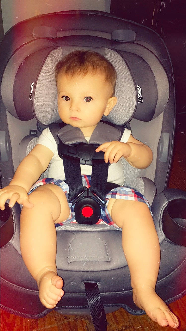 Kai is registered to the contest to win money with this photo: auto_part, baby_in_car_seat, car, car_seat, child, city_car, person, product, seat_belt, toddler, vehicle