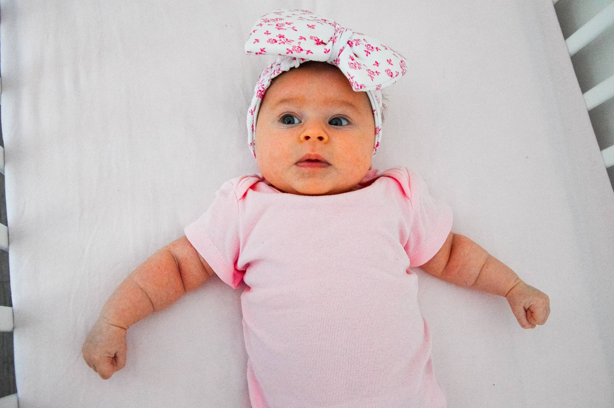 Evelyn Anastasia participe au concours pour gagner de l'argent avec cette photo : baby, baby_toddler_clothing, cheek, child, collar, costume_hat, eyelash, fashion_accessory, gesture, happy, headwear, linens, lip, magenta, pattern, peach, person, pink, portrait_photography, sleeve