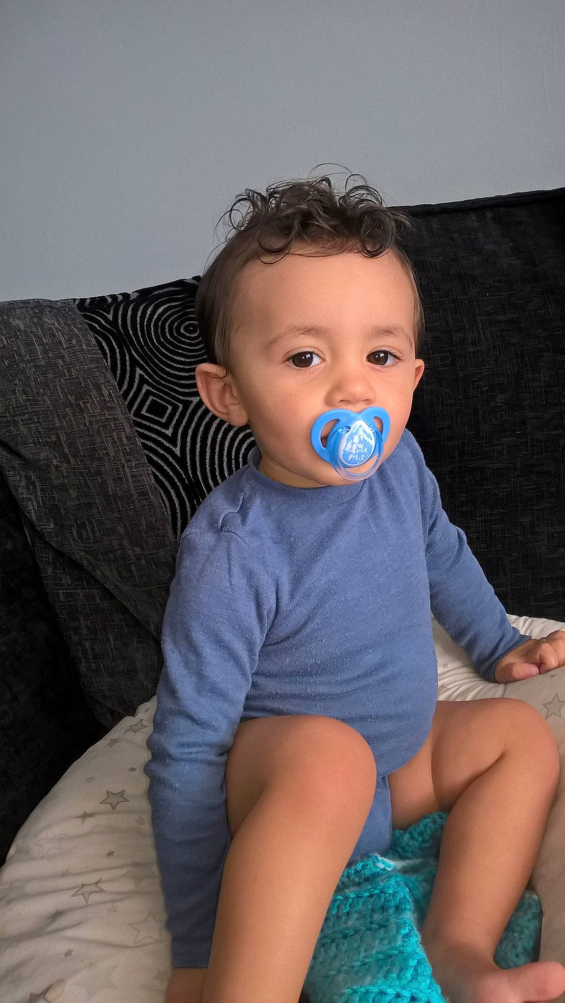 Lucian is registered to the contest to win money with this photo: baby, blue, child, leg, person, sitting, toddler