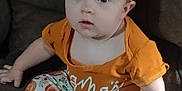 Willow joined the competition — help win amazing prizes! baby, child, infant, headband, pumpkin, orange_clothing, pants, sitting, couch, indoor, curious, wide_eyes, cute, toes, autumn_theme, soft_lighting, portrait, person, young, cozy