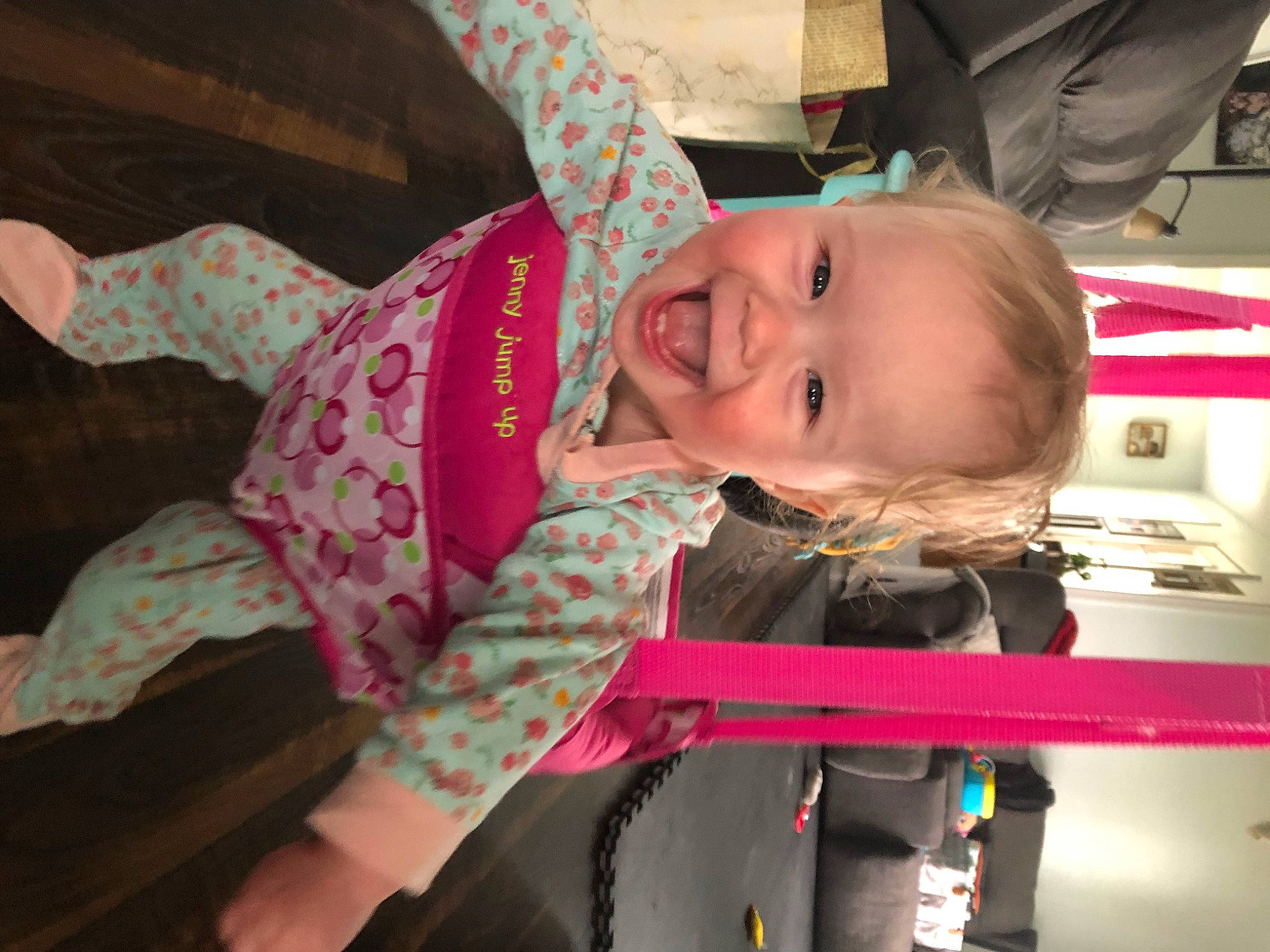 Helena is registered to the contest to win money with this photo: baby, baby_carriage, baby_products, baby_toddler_clothing, cheek, child, eye, face, fun, hairstyle, happy, head, human_body, iris, pattern, person, pink, sitting, skin, smile