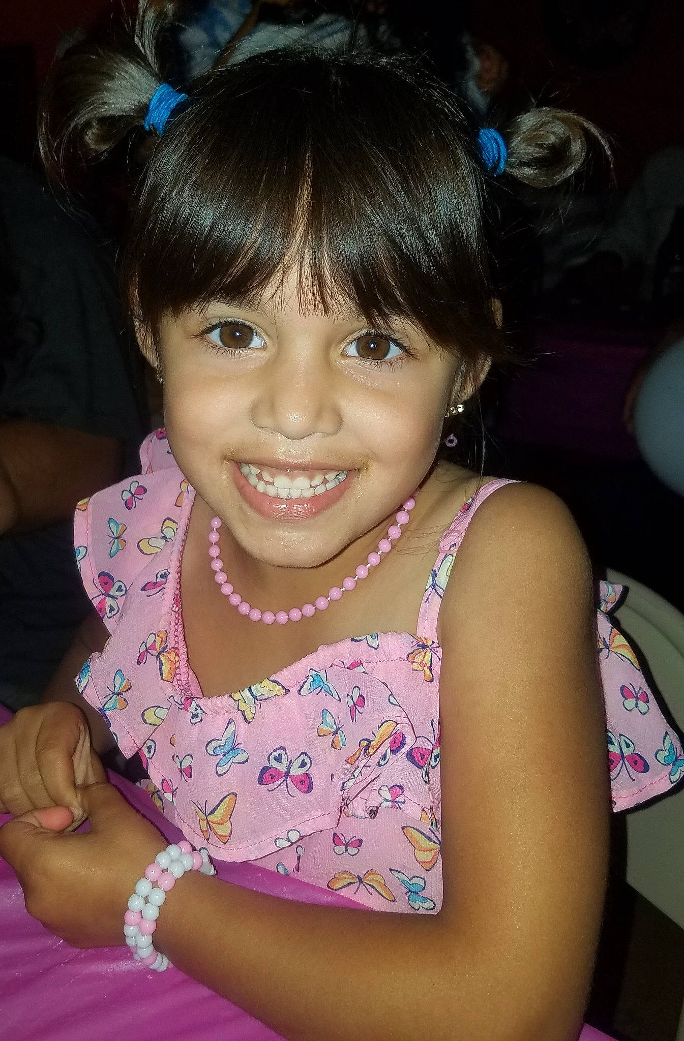 Kynleigh is registered to the contest to win money with this photo: bangs, beauty, black_hair, brown_hair, child, child_model, chin, ear, eyelash, face, forehead, hair, hairstyle, joy, long_hair, person, pink, smile