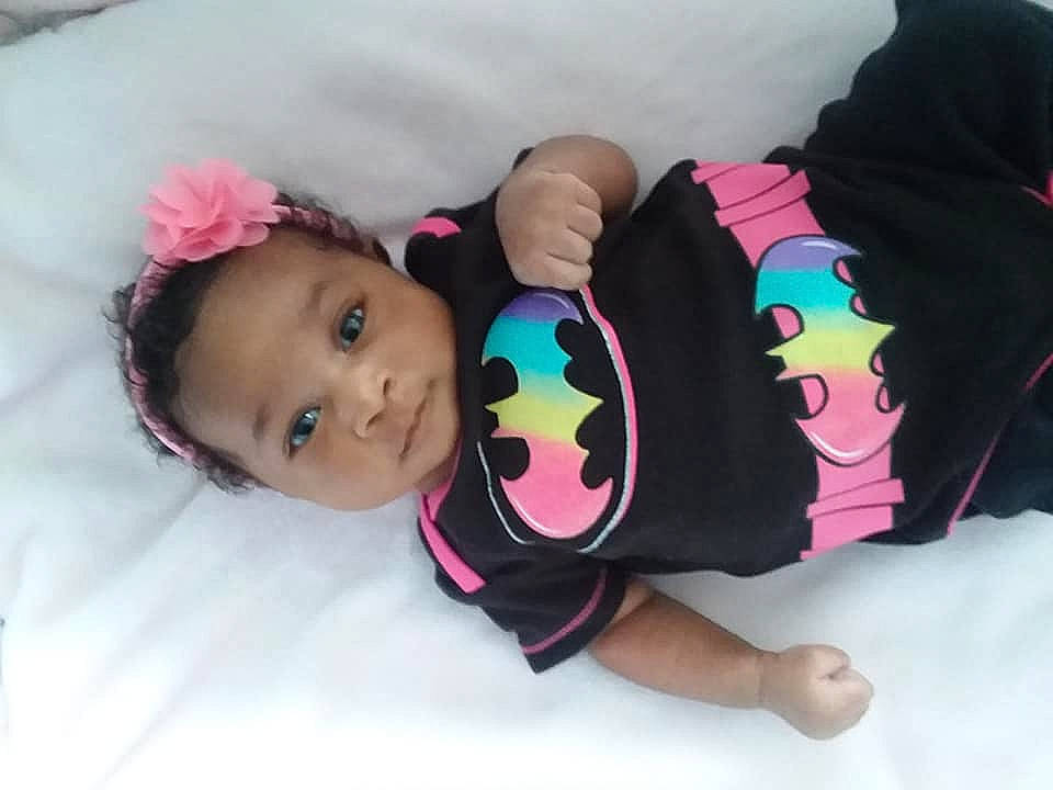 Cordelia joined the competition — help win amazing prizes! baby, baby_products, baby_toddler_clothing, black_hair, cheek, child, ear, fashion_accessory, hair_accessory, head, headgear, outerwear, person, pink, play, product, textile, toddler, toy