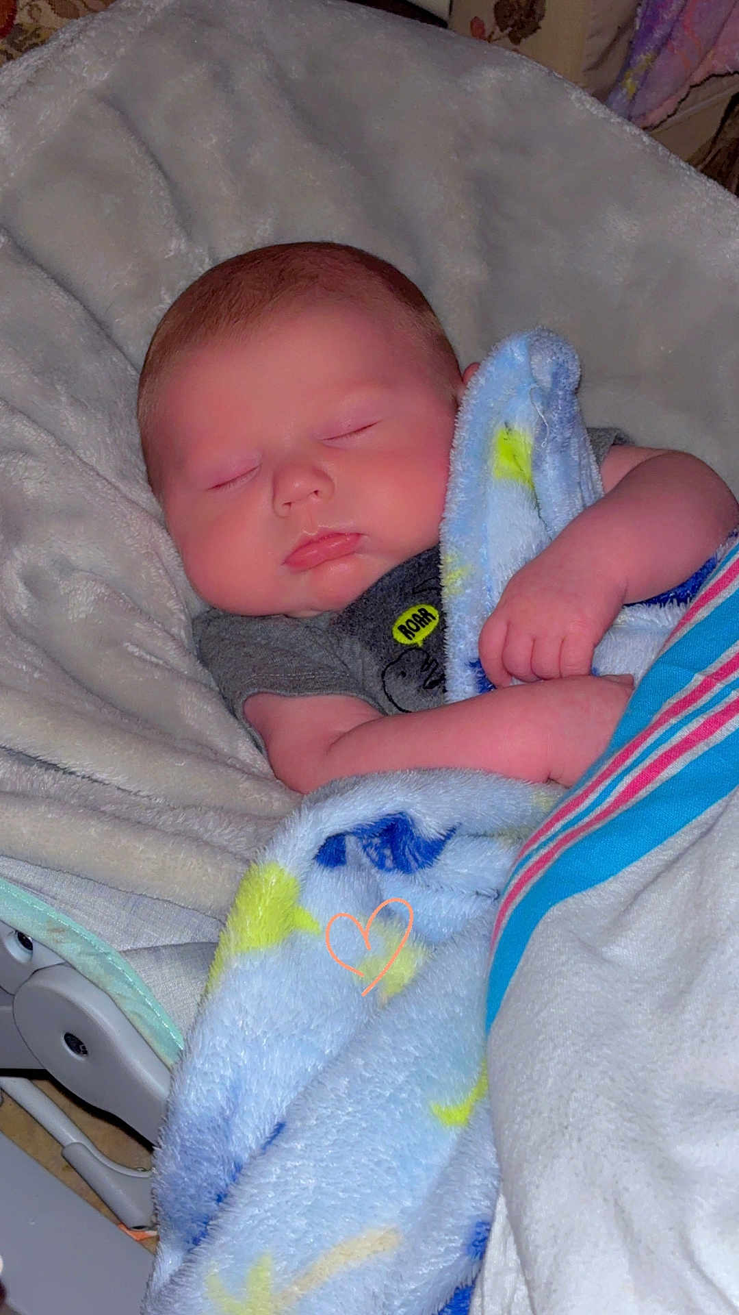Eli is registered to the contest to win money with this photo: baby, blanket, sleeping, infant, soft, cute, cozy, face, child, rest, peaceful, furniture, clothing, hand, head, portrait, indoors, comfort, toddler, wrapped