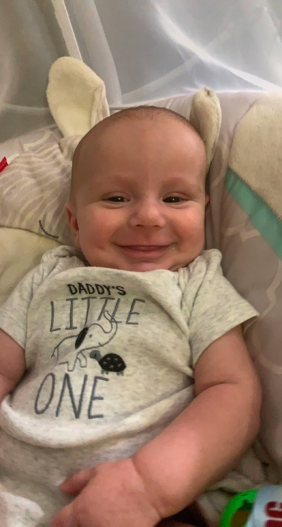 Bryson is registered to the contest to win money with this photo: baby, cheek, chin, comfort, eye, eyebrow, facial_expression, forehead, gesture, hairstyle, happy, iris, joy, lip, mammal, mouth, nose, person, product, skin