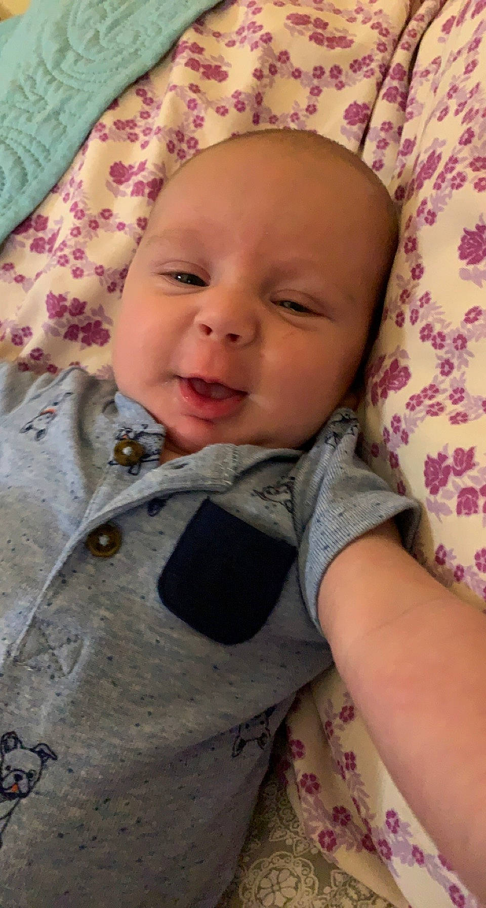 Bryson is registered to the contest to win money with this photo: baby, baby_toddler_clothing, cheek, chin, comfort, eye, eyebrow, face, gesture, happy, head, iris, lip, nose, person, pink, skin, sleeve, smile, textile