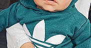 Naël participe au concours pour gagner de l'argent avec cette photo : adidas_logo, adult_hand, baby, big_eyes, casual_wear, child, closeup, cute, expression, hand, holding, hoodie, indoor, infant, logo, looking_at_camera, portrait, sweatshirt, teal_hoodie, wide_eyes