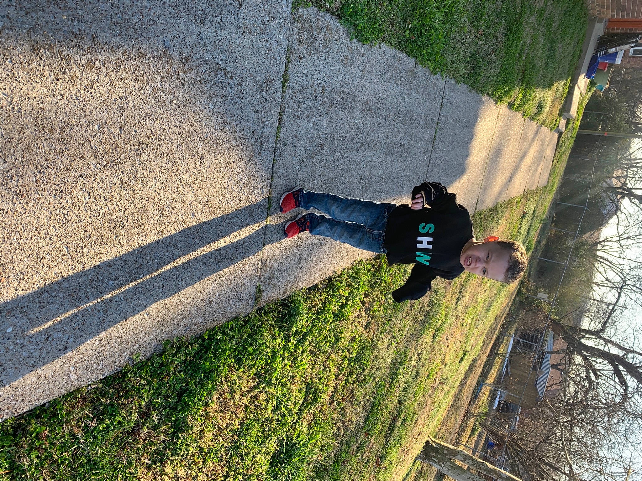 Jett joined the competition — help win amazing prizes! asphalt, concrete, curb, fun, grass, grass_family, landscape, leisure, people_in_nature, person, plant, recreation, road_surface, shadow, shrub, sidewalk, slope, tints_and_shades, tree, water