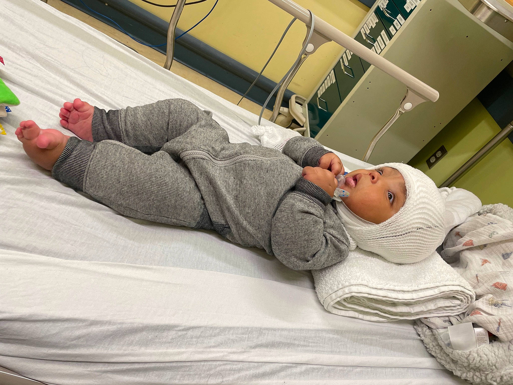 Winston joined the competition — help win amazing prizes! bed, bedding, comfort, event, hat, headwear, health_care, hospital, hospital_bed, hospital_gown, human_leg, joint, knee, linens, medical, medical_equipment, medical_procedure, patient, person, room