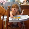 Rory joined the competition — help win amazing prizes! toddler, high_chair, fork, plate, food, kitchen, wooden_chair, child, red_hair, table, indoor, furniture, person, meal, baby, dining, household_items, window, curtain, clothing