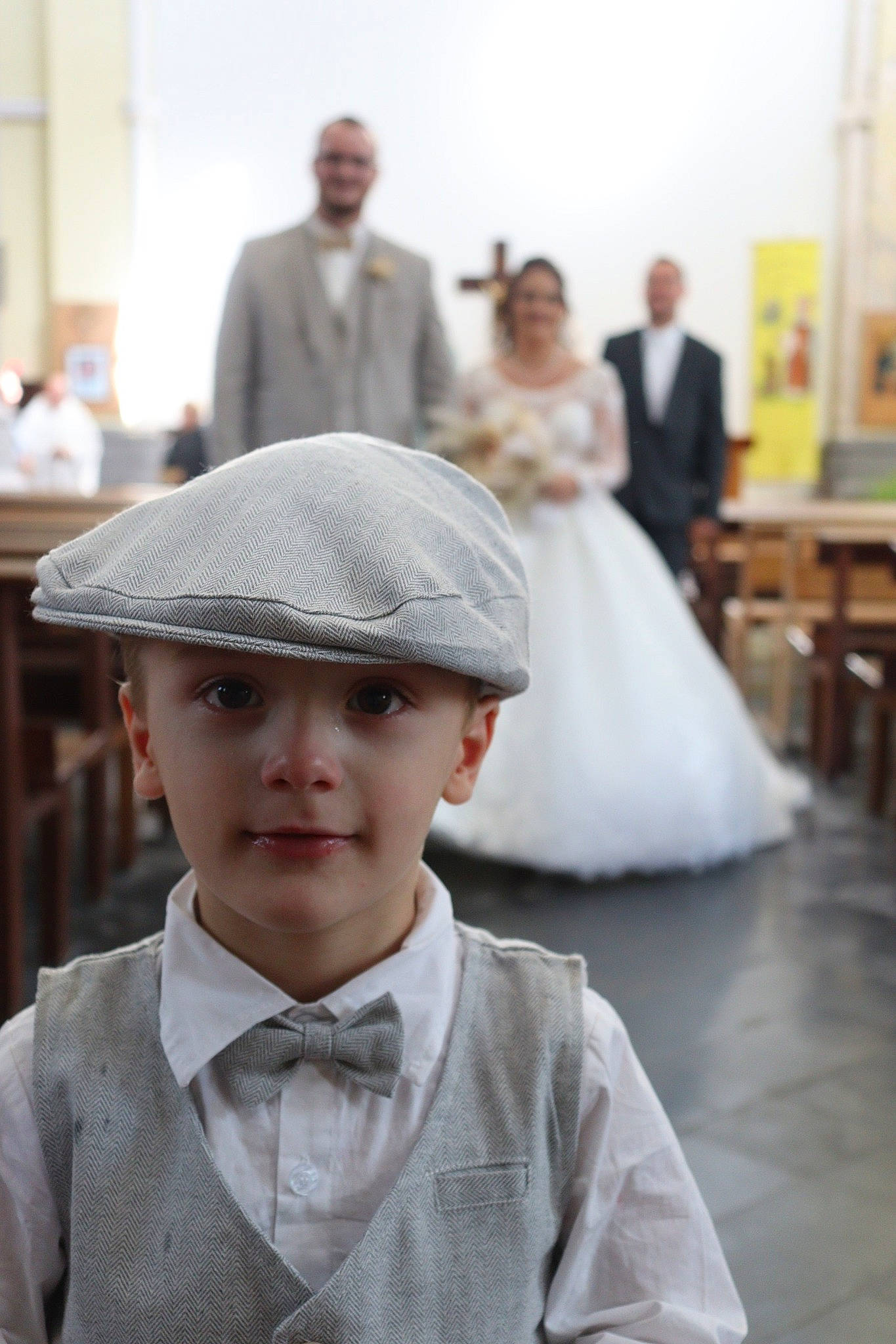 Antonin participe au concours pour gagner de l'argent avec cette photo : blurred, bridal_accessory, bridal_clothing, bride, cap, child, clothing, dress, event, facial_expression, fashion, formal_wear, gown, happy, hat, headgear, headwear, joy, people, person