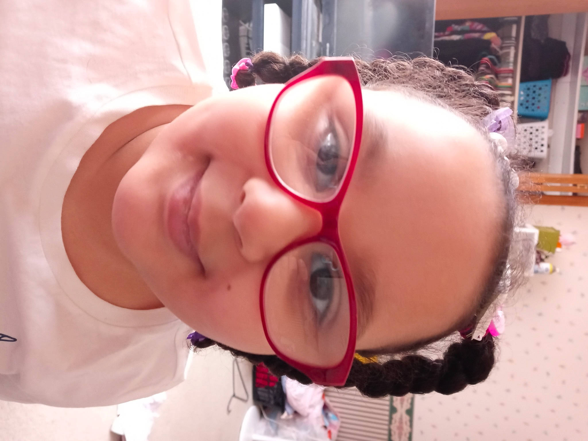 Torah is registered to the contest to win money with this photo: audio_equipment, cheek, ear, eyebrow, eyelash, eyewear, gesture, glasses, helmet, human_body, jaw, joy, lip, mouth, nose, person, personal_protective_equipment, pink, skin, smile