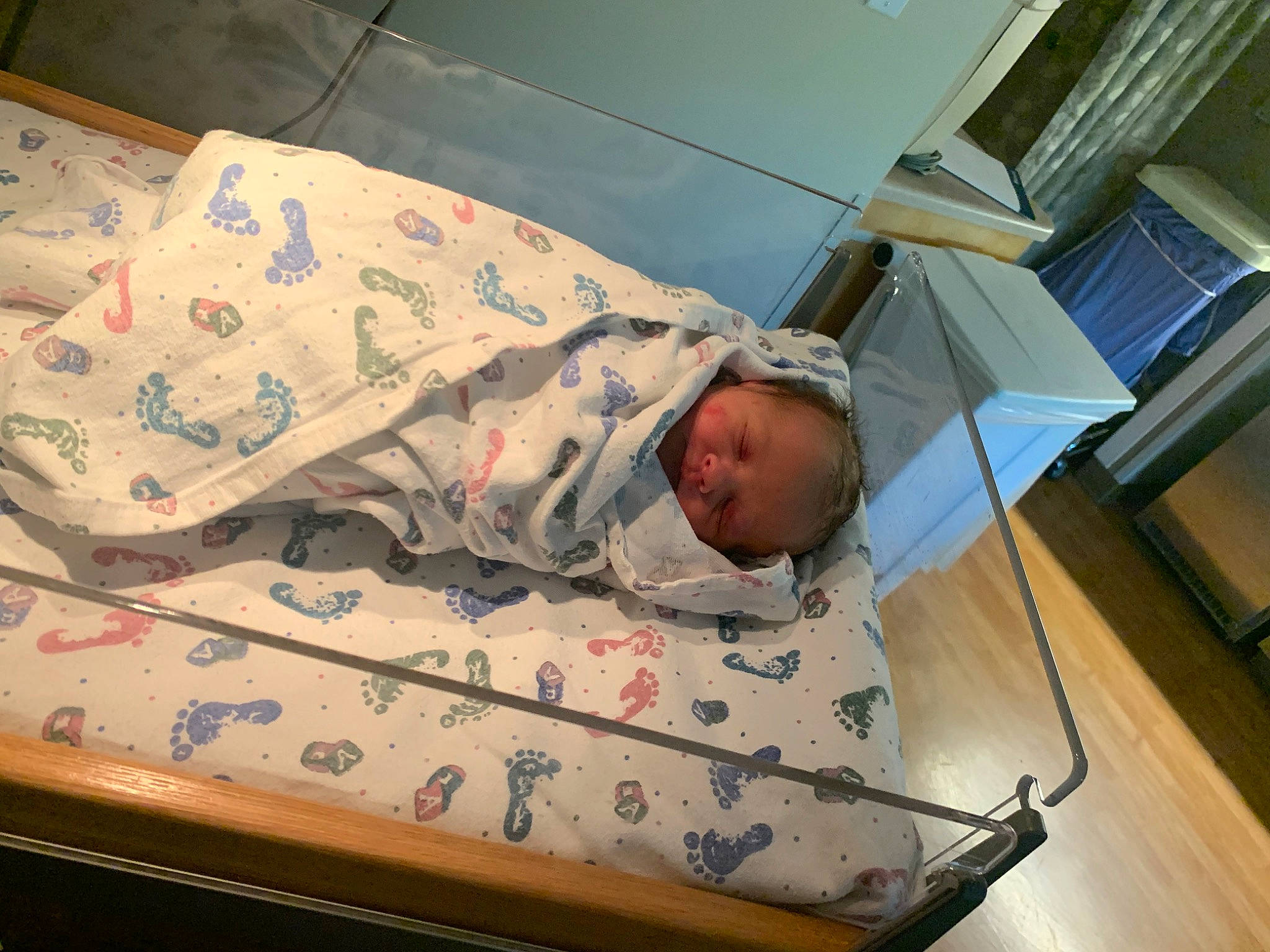 Arya is registered to the contest to win money with this photo: baby, baby_products, baby_safety, bed, bed_sheet, bedding, bedtime, child, comfort, flooring, linens, military, military_camouflage, military_person, nap, pattern, person, room, soldier, toddler