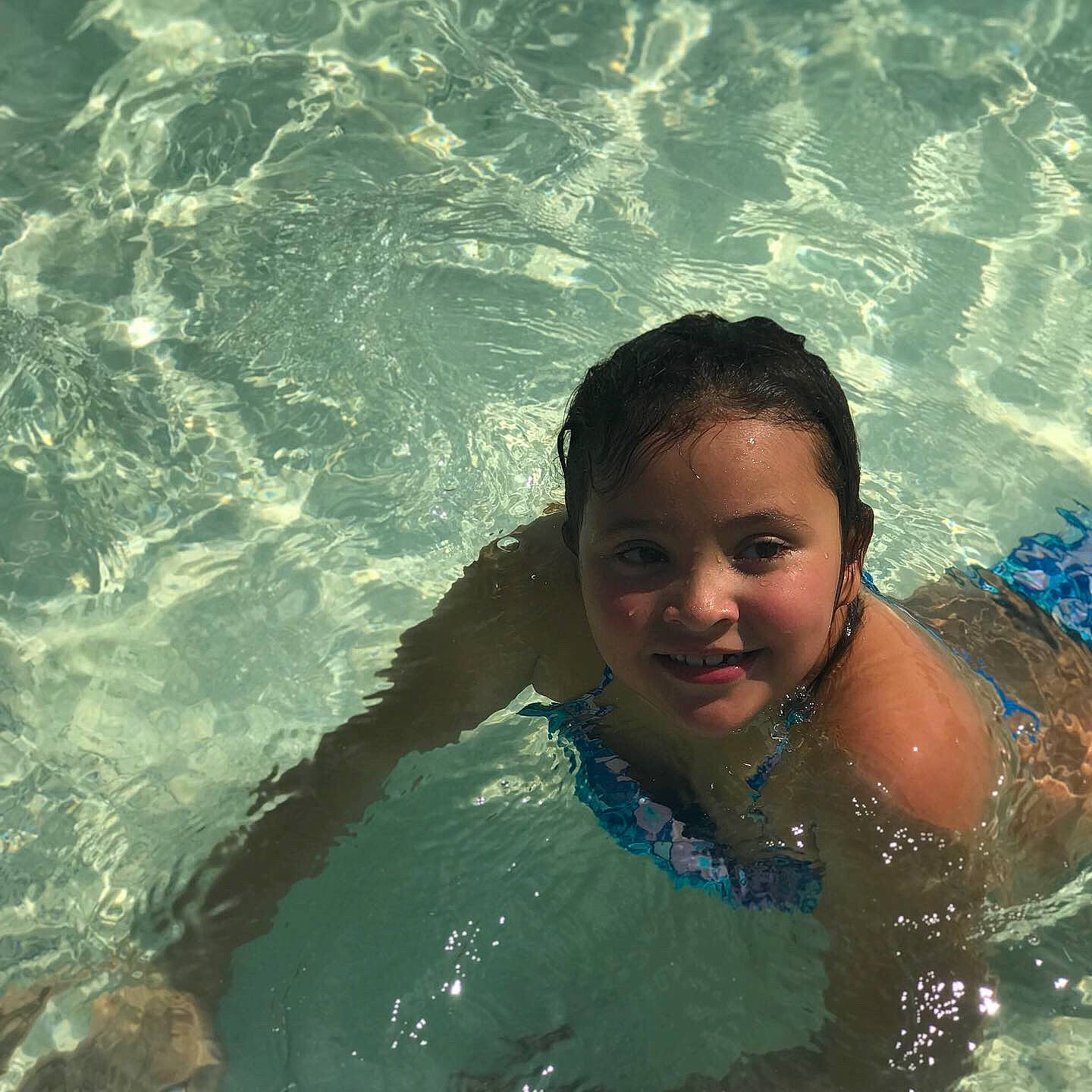 Kaylea is registered to the contest to win money with this photo: face, fun, happy, joy, leisure, leisure_centre, person, recreation, smile, summer, swimming, swimming_pool, vacation, water