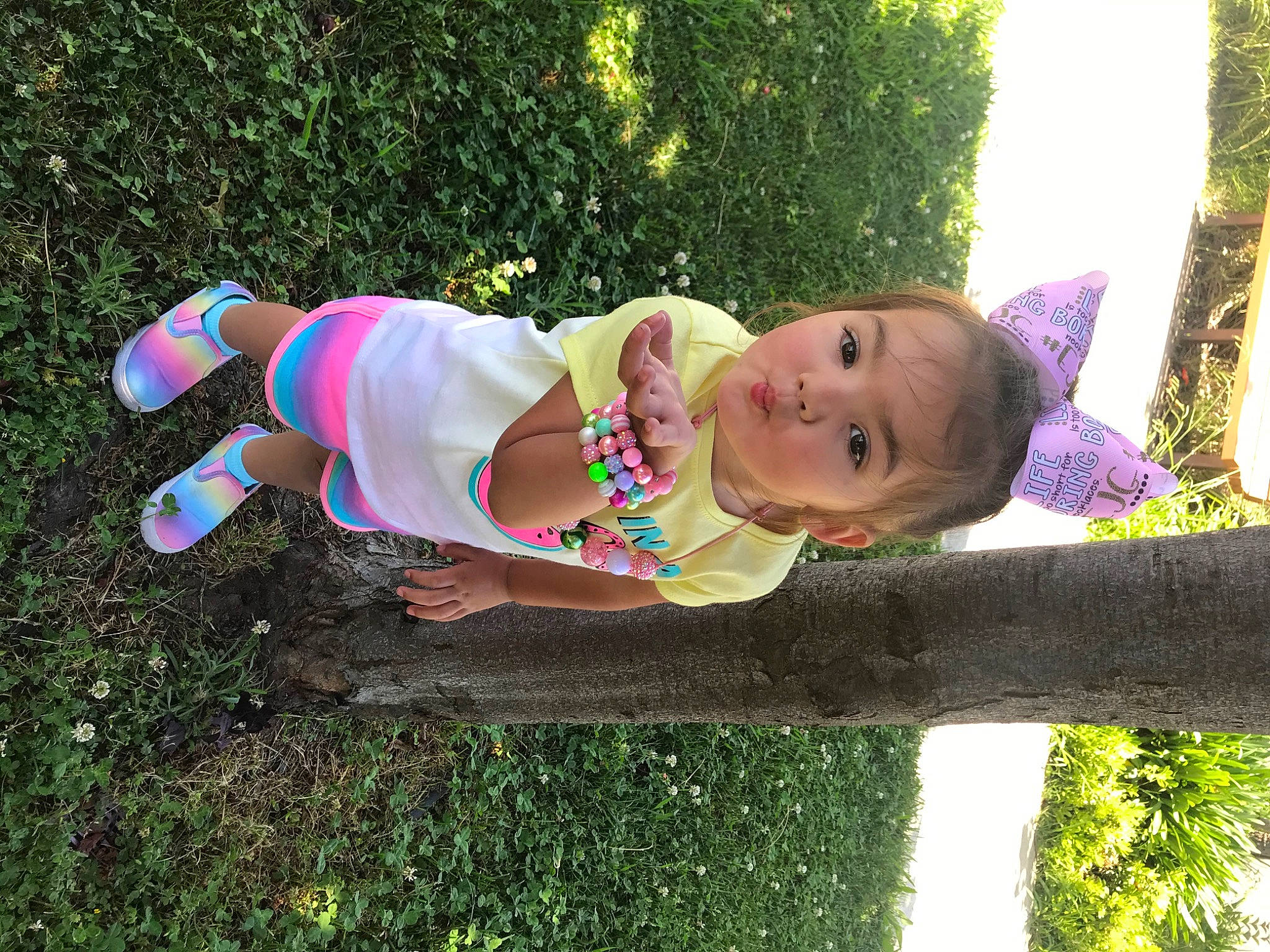 Lilli is registered to the contest to win money with this photo: child, grass, leisure, person, plant, play, toddler, tree