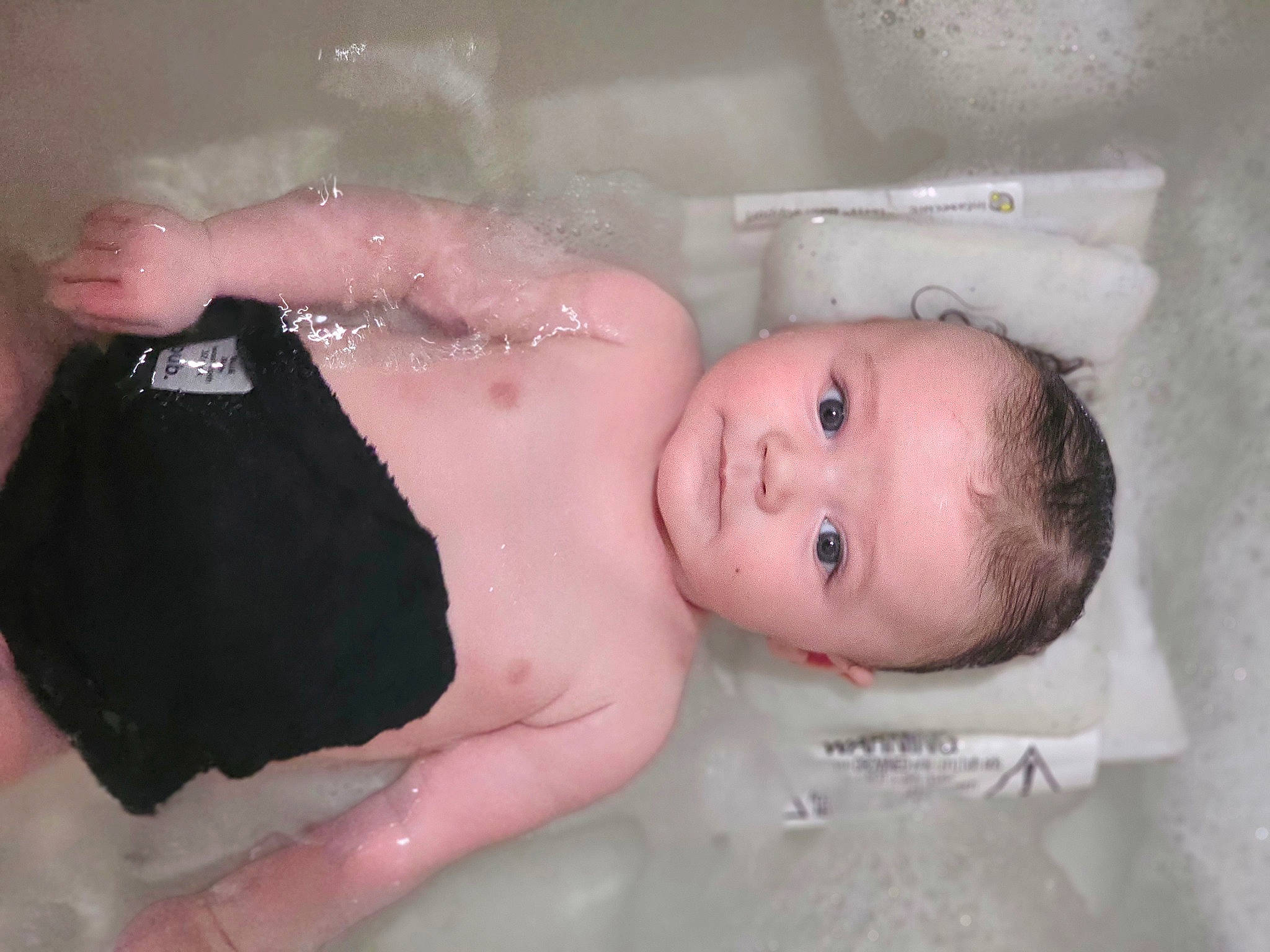 Archer is registered to the contest to win money with this photo: abdomen, baby, baby_bathing, baby_toddler_clothing, barechested, bathing, bathtub, cheek, chest, child, eyebrow, finger, foam, fun, gesture, happy, person, skin, stomach, toddler