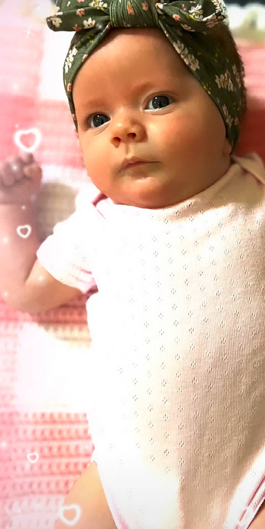 Mackenzie joined the competition — help win amazing prizes! baby, baby_toddler_clothing, cap, cheek, child, eye, eyelash, facial_expression, fashion_accessory, happy, hat, lip, pattern, person, photograph, pink, skin, sleeve, toddler, wool