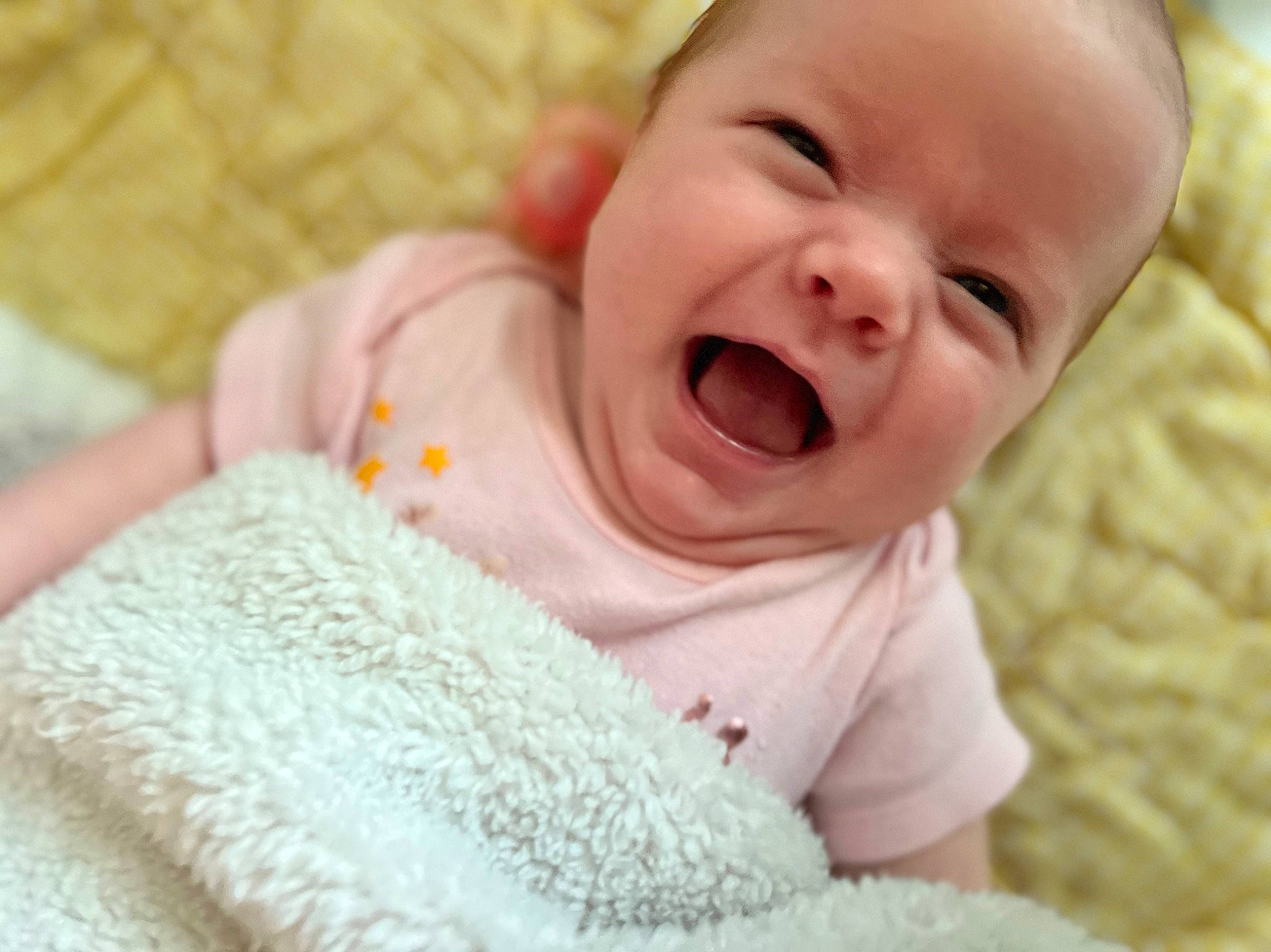 Mackenzie is registered to the contest to win money with this photo: baby, baby_toddler_clothing, cheek, close_up, comfort, eye, finger, grass, happy, head, headgear, iris, linens, lip, nose, person, skin, sleeve, smile, textile