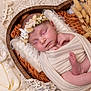 Alessia Canzonieri participe au concours pour gagner de l'argent avec cette photo : newborn, baby, sleeping, wrapped, headband, floral, wooden_bowl, blanket, soft_fabric, dried_flowers, peaceful, infant, cute, portrait, indoors, closeup, skin, hands, feet, cozy