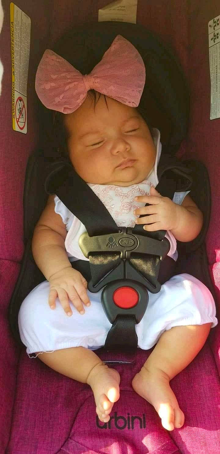 Aileen is registered to the contest to win money with this photo: baby, baby_carriage, baby_in_car_seat, baby_products, child, person, pink, product, sitting, skin, toddler