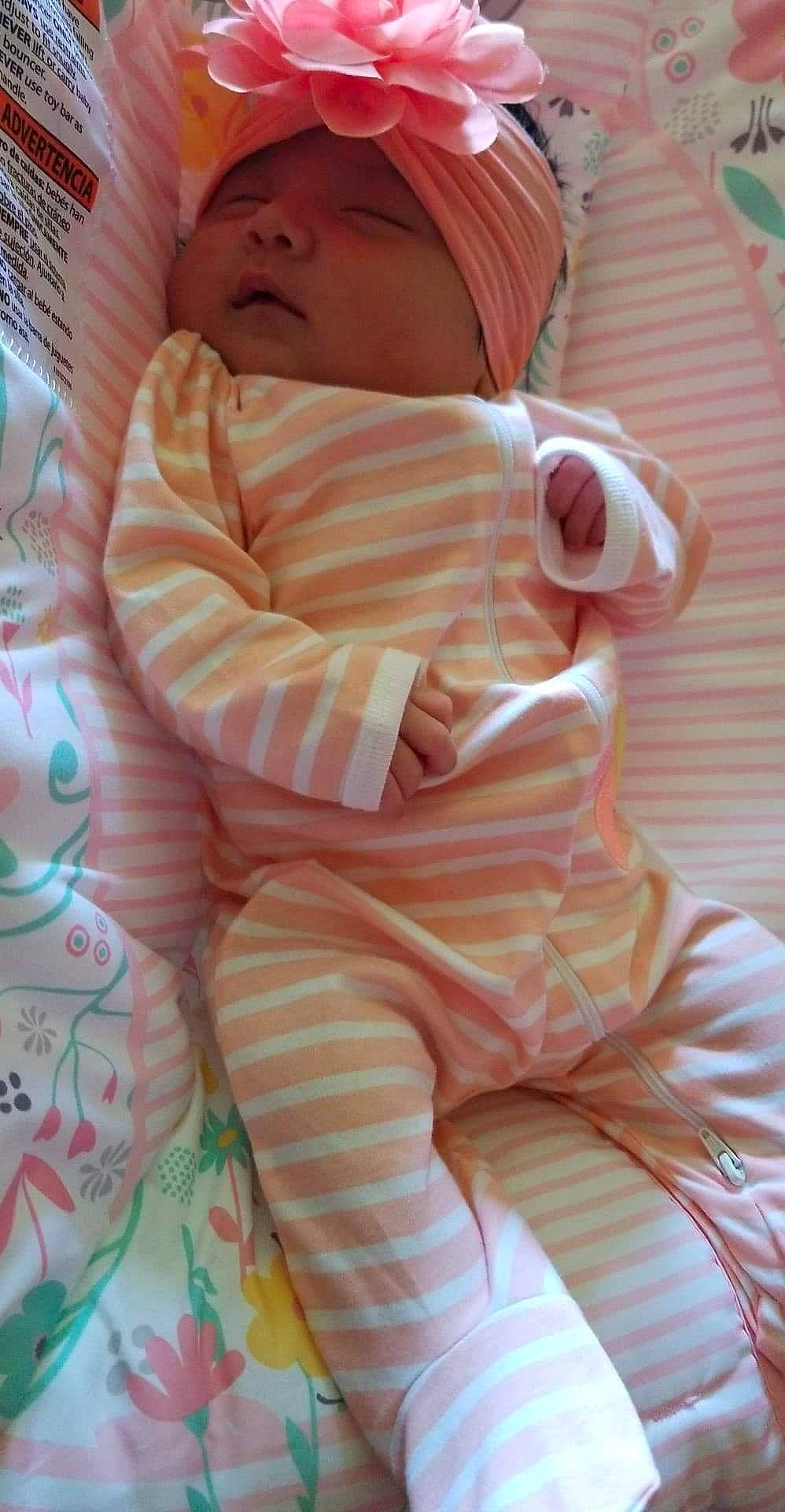 Aileen is registered to the contest to win money with this photo: baby, cheek, child, peach, person, pink, skin, sleep, smile, textile, toddler