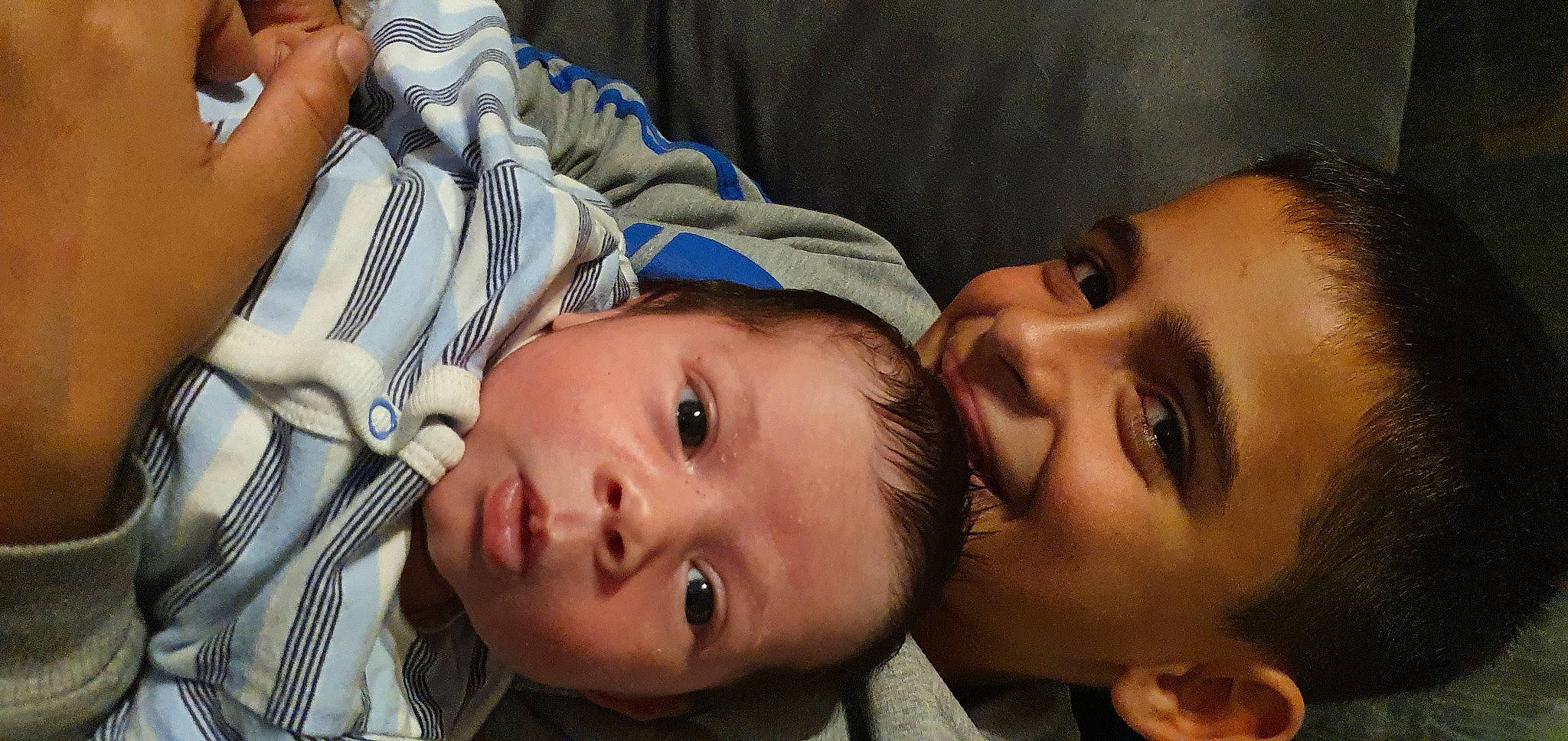 Rudy participe au concours pour gagner de l'argent avec cette photo : baby, baby_products, baby_toddler_clothing, cheek, child, chin, comfort, ear, eye, eyebrow, forehead, happy, human, interaction, iris, lip, organ, people, person, skin