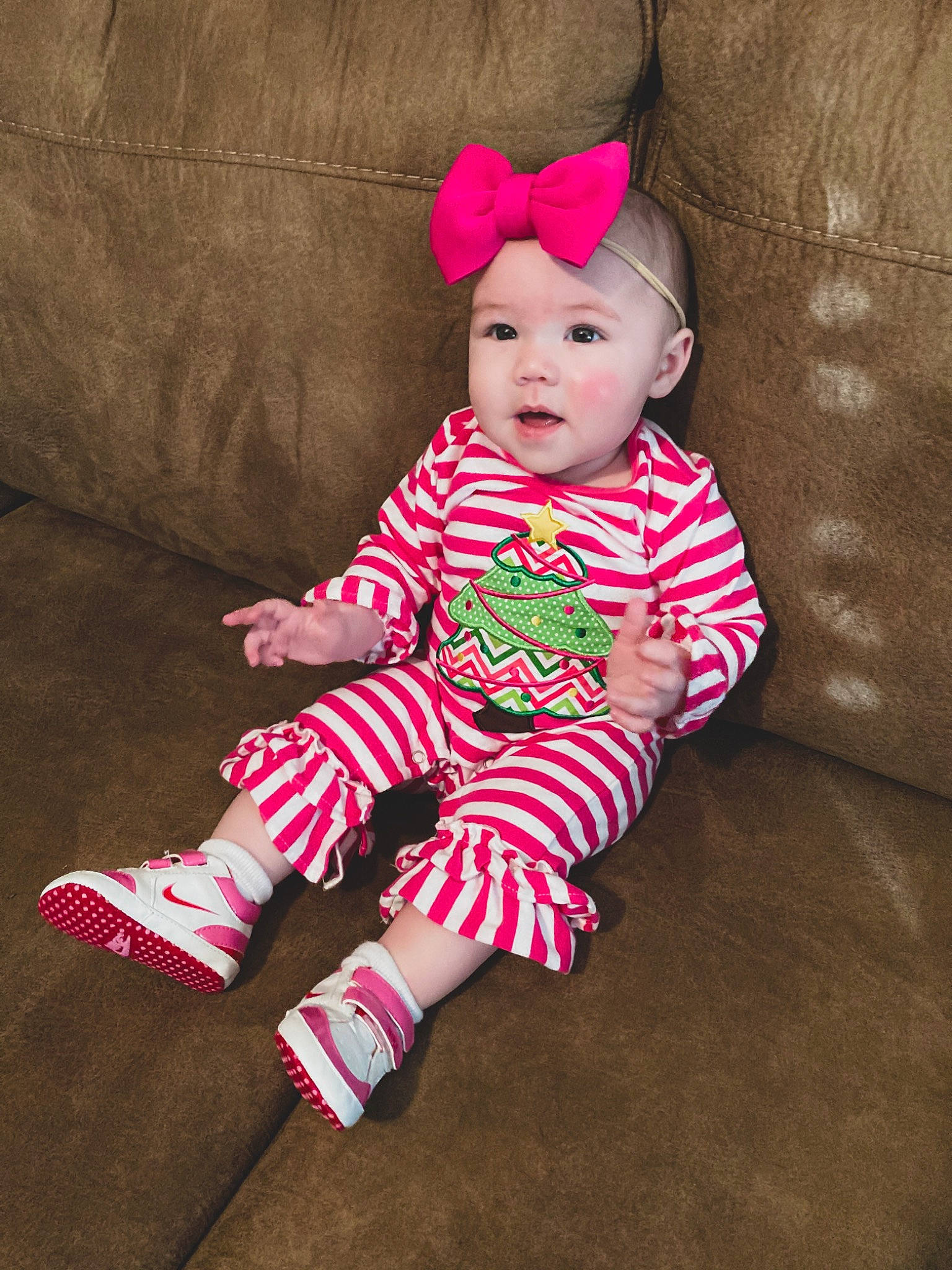 Mia Reece joined the competition — help win amazing prizes! baby, baby_toddler_clothing, cheek, child, clothing, comfort, costume_hat, dress, happy, head, headgear, headwear, leg, magenta, pattern, person, pink, sitting, skin, sleeve