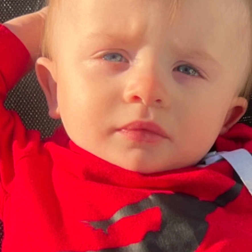 Brayden joined the competition — help win amazing prizes! baby, clothing, cosmetics, cushion, face, frown, head, homedecor, hood, hoodie, knitwear, lipstick, newborn, person, photography, portrait, sad, sweater, sweatshirt, t_shirt