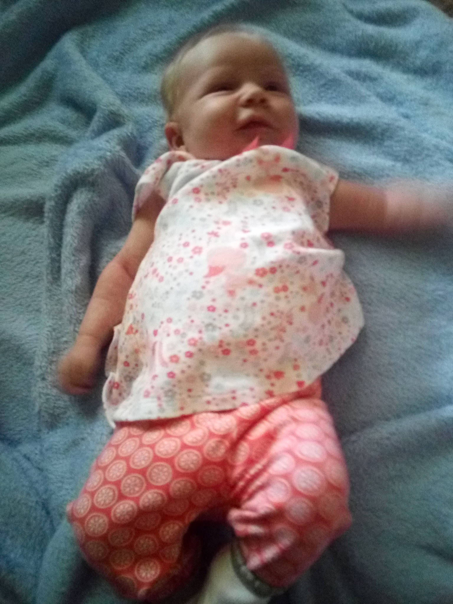 Nola is registered to the contest to win money with this photo: baby, birth, child, pattern, person, toddler