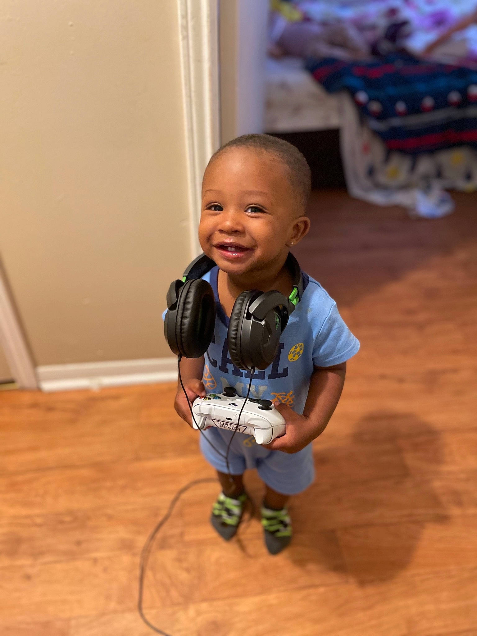 Kingston joined the competition — help win amazing prizes! baby, baby_toddler_clothing, child, electric_blue, floor, flooring, foot, fun, happy, hardwood, joy, laminate_flooring, leg, person, room, sitting, skin, smile, toddler, wood